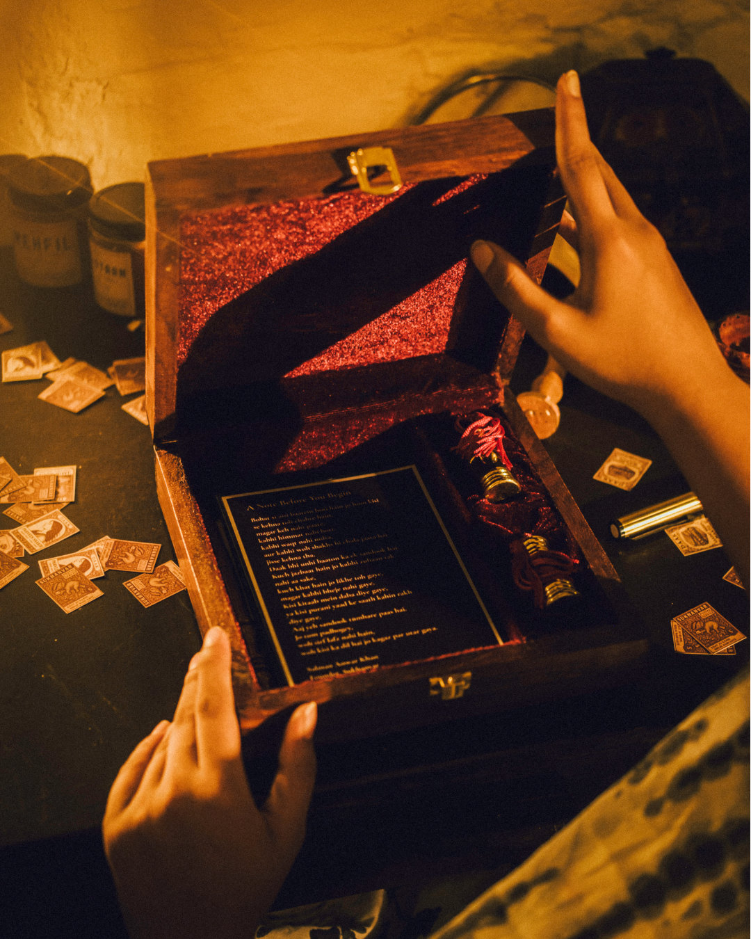 Daak limited edition box open showing letters, attars and keepsakes