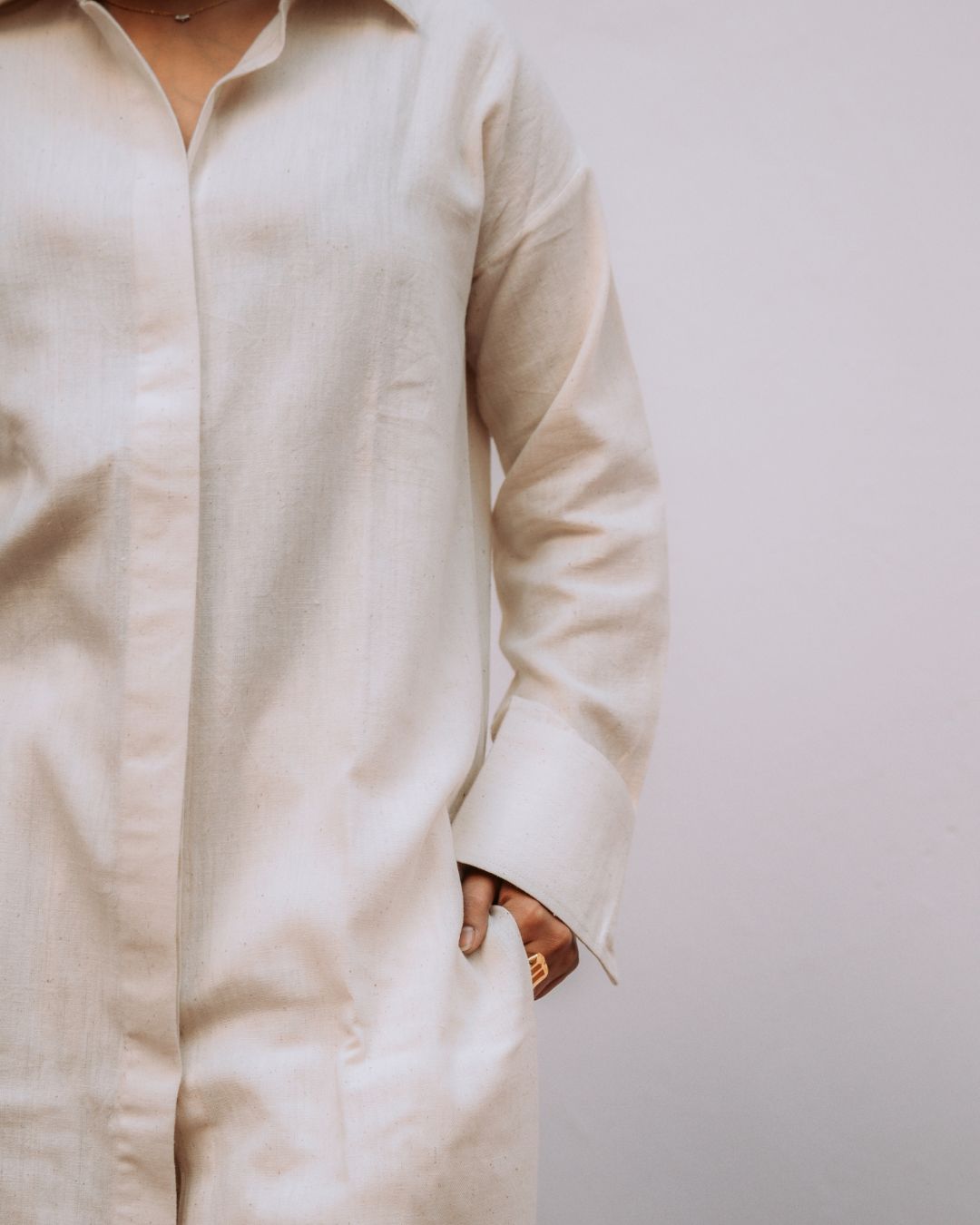 Beige shirt worn by a person on a plain background Sarmad Clothing collection by sukhanvar Mehr Co Ord Set Kurta Pant