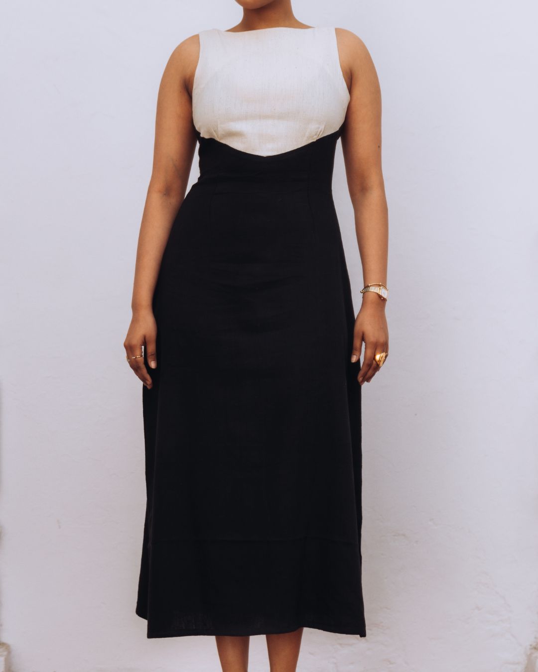 Person wearing a black and white dress against a plain background Sarmad Clothing collection by sukhanvar Mehvar Dress